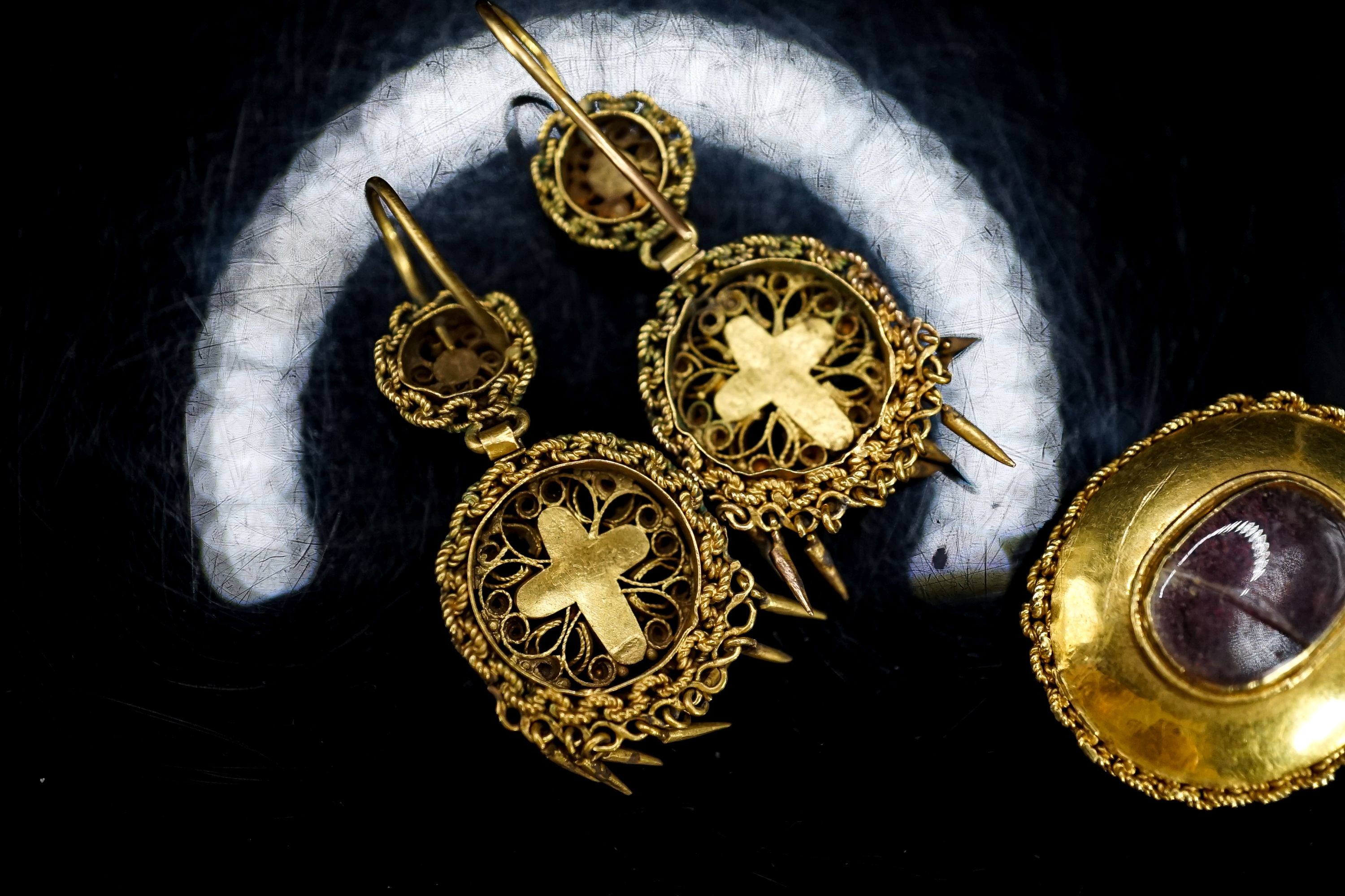 A Victorian yellow metal and turquoise set oval memorial pendant, 24mm, gross 7.5 grams and a pair of similar gilt metal tassel drop earrings.